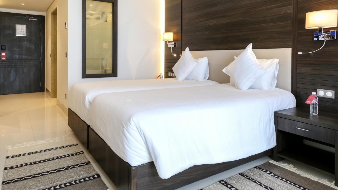 Radisson Hotel Сфакс Экстерьер фото A bedroom at the hotel